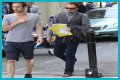 Jonny Lee Miller flashes ink for Ellen charity